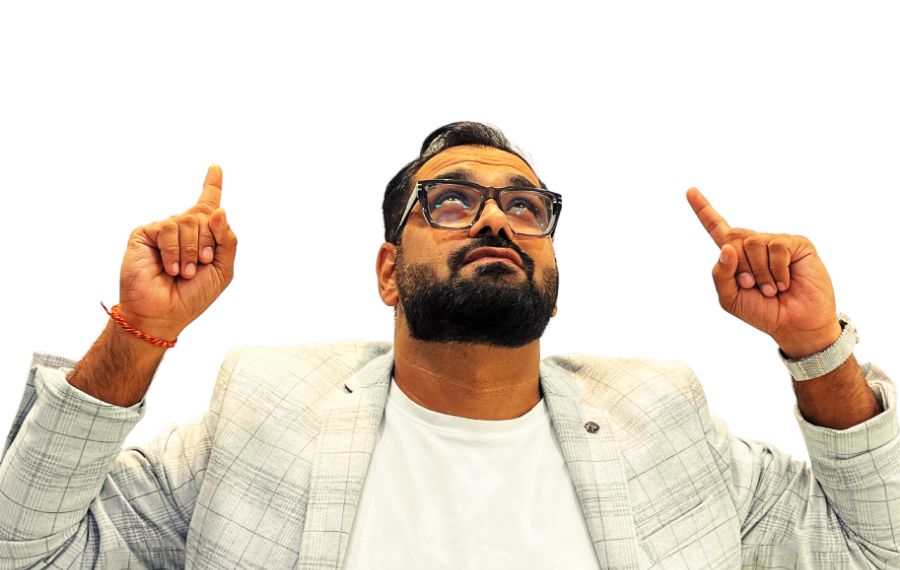 Rishi Arora looking up and pointing at the words Stay curious